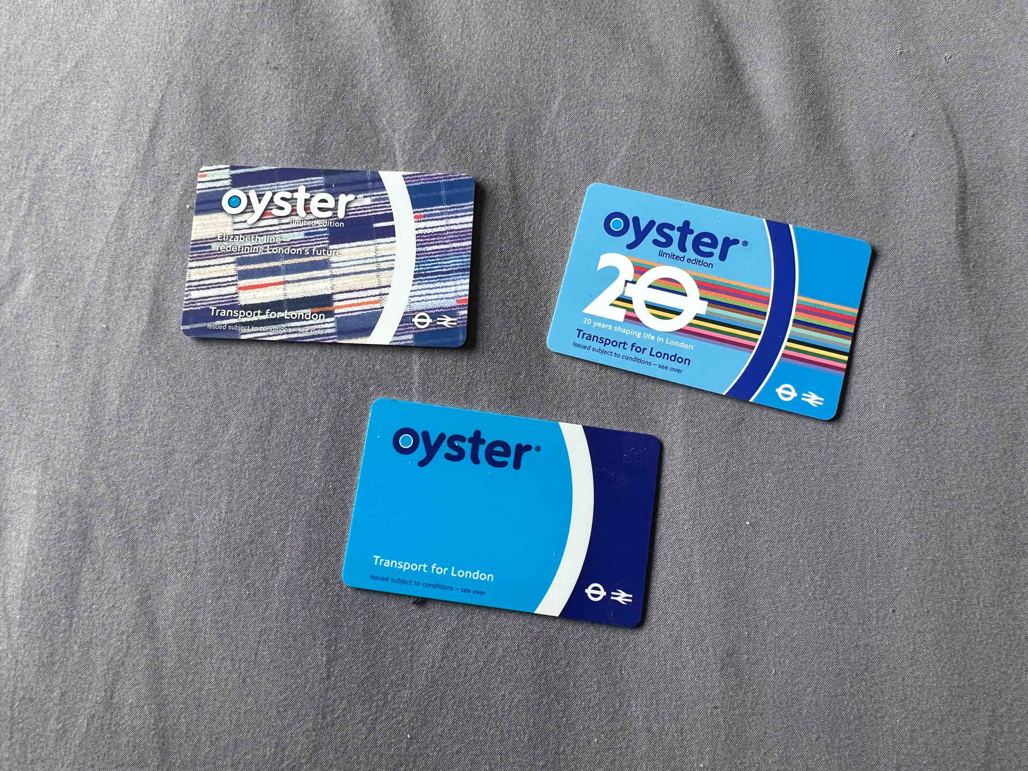 A Collection of Oyster Cards, one Standard, two commemorative